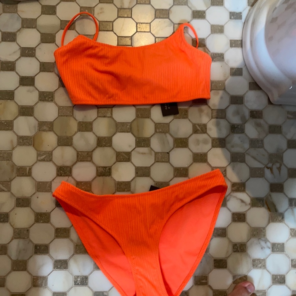 Brand new never worn triangl bikini